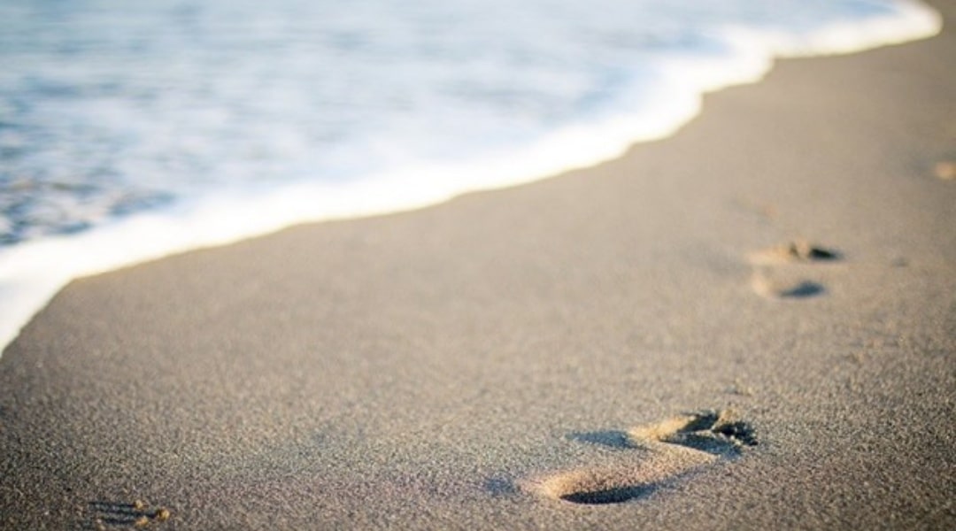 footprints on the beach